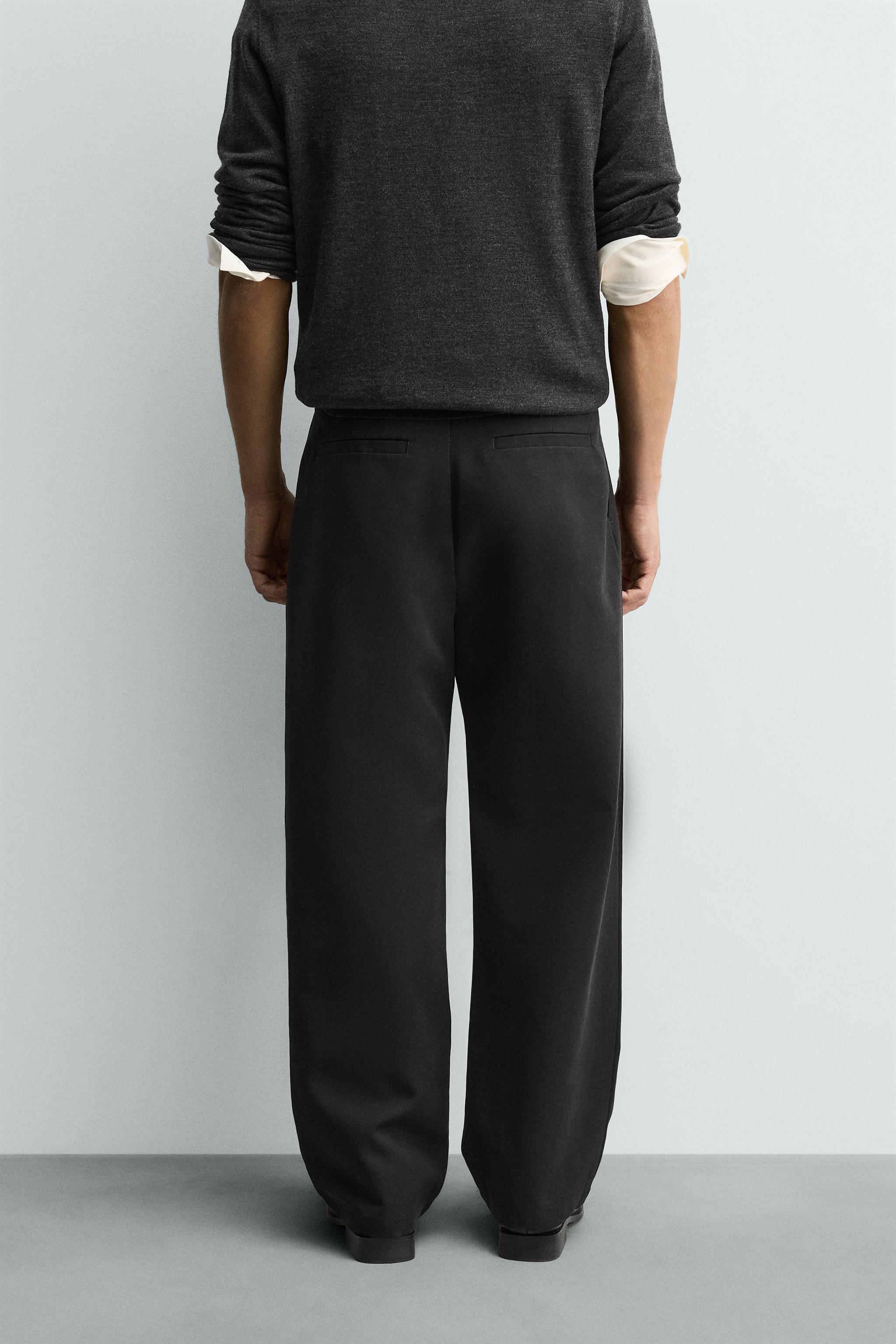 RELAXED BALLOON FIT PLEATED PANTS